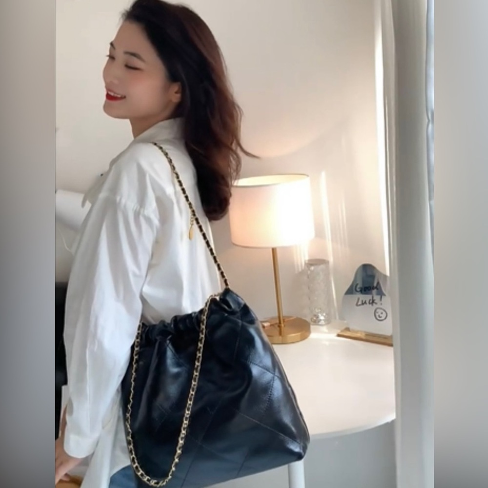 Designer styled bag with real lambskin leather